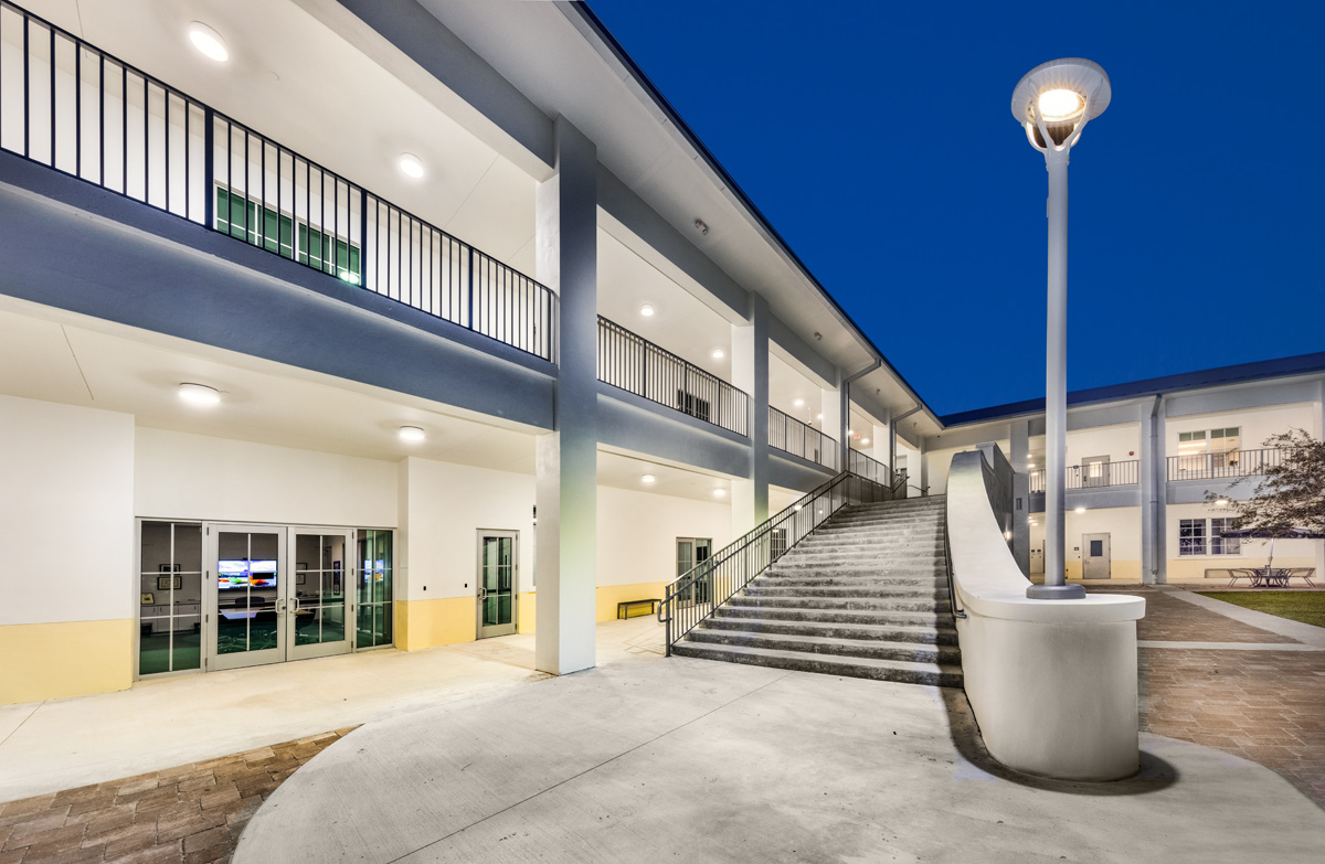 Architectural dusk view of outdoor stairs at Palmer Trinity student center in Miami, FL